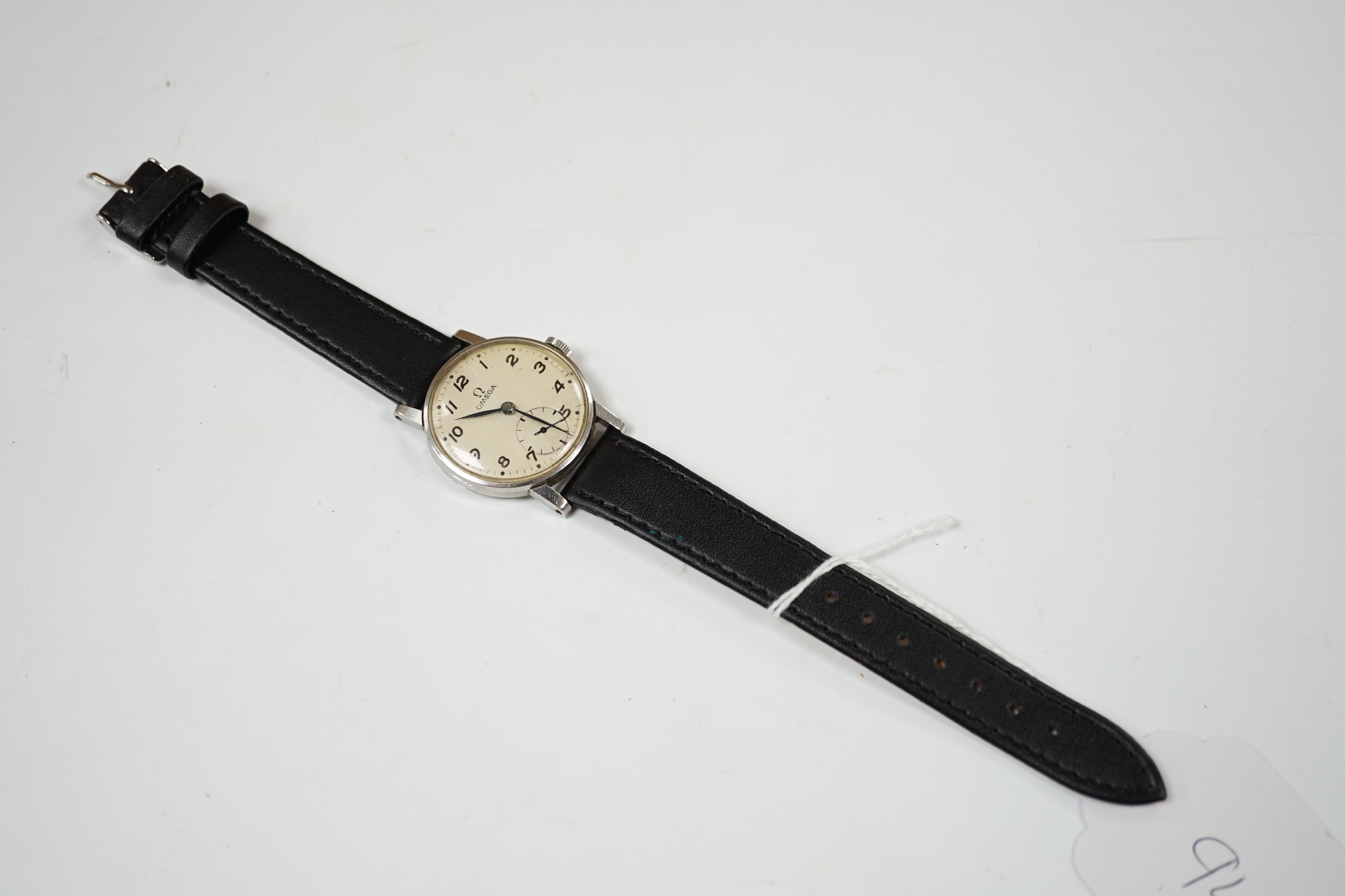 A gentleman's stainless steel Omega manual wind wrist watch, with subsidiary seconds, on later associated leather strap, case diameter 30mm, no box or papers.